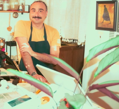A welcoming face behind the original café counter
